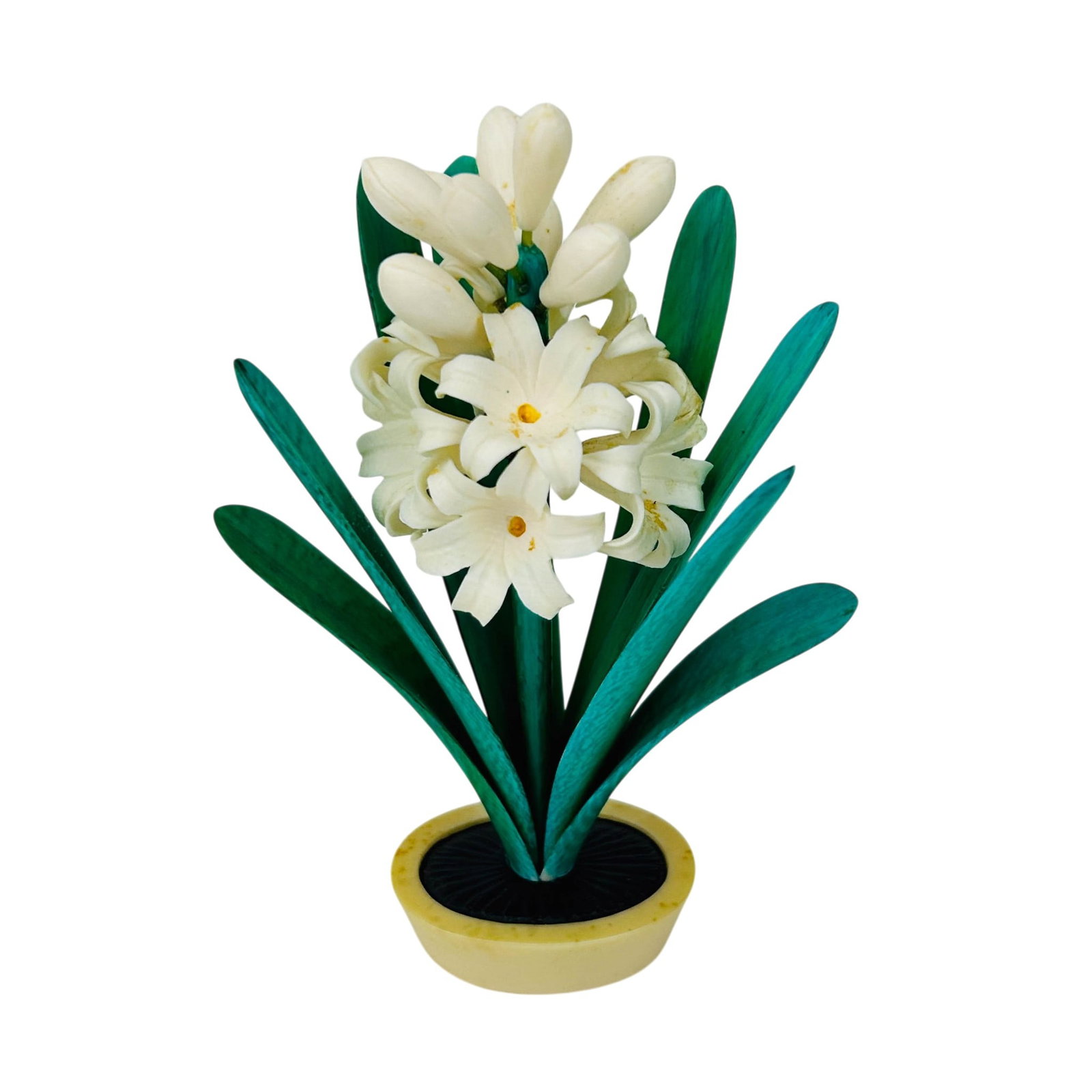Chinese Carved Hyacinth Floral Bouquet Sculpture: Chinese floral bouquet sculpture hand carved from naturally occurring material. Depicts blooming white hyacinths with closed buds rising among elongated green foliage. Arrangement rests within a circu