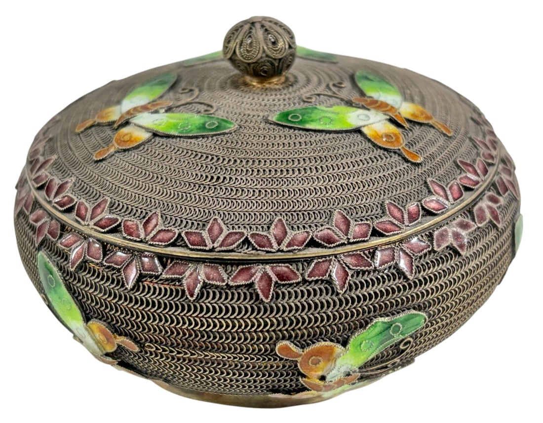 Chinese Export Silver & Enamel Covered Box: Round Chinese export silver covered box with intricate filigree work and hand-painted enamel butterfly decoration in green, orange, white, and lavender tones. Domed lid with pierced finial knop and bl