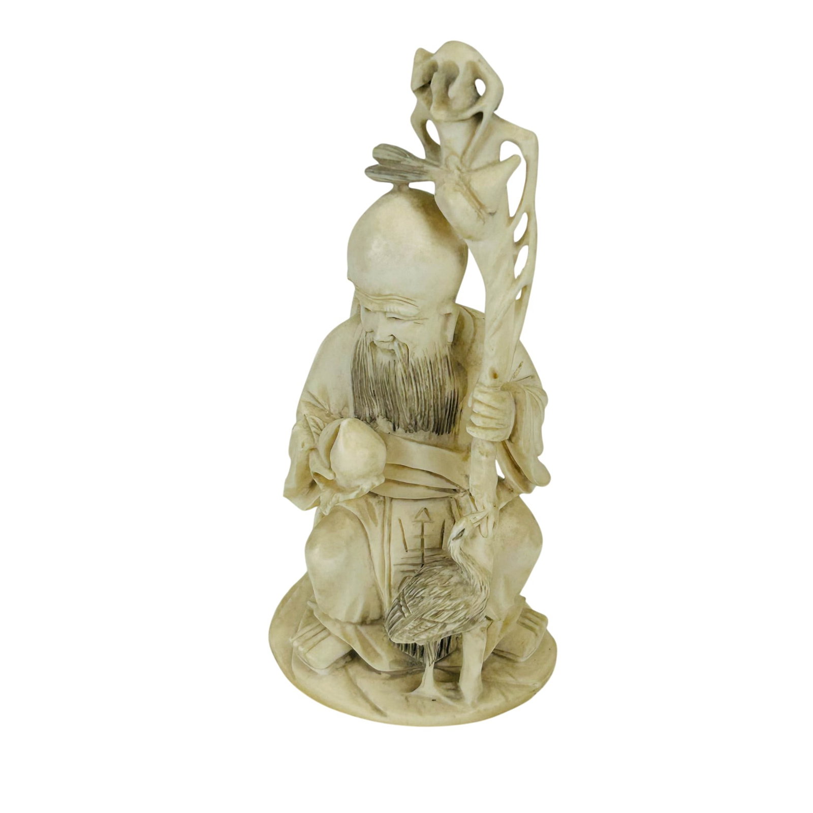 Chinese Scholar Wise Man Carved Figurine w/ Staff: Chinese figural sculpture depicting Shou Lao, the god of longevity carved of naturally occurring material. Depicts this deity figure in seated pose, holding a shell like object in one hand, a staff