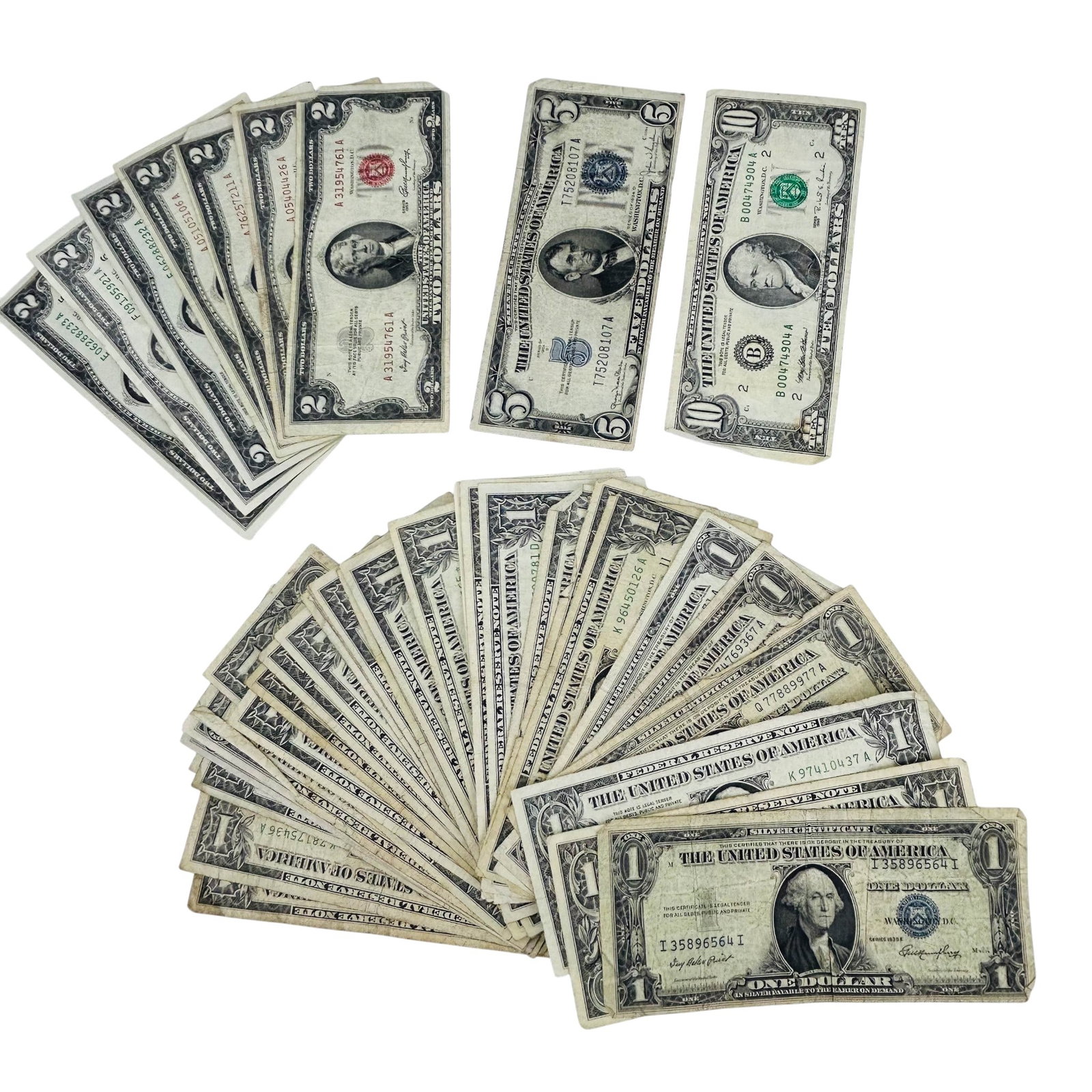 $1, $2, $5 & $10 US Currency Bills Face Value $65: Collection of assorted United States paper currency comprising Silver Certificates, Federal Reserve Notes, and United States Notes. Group includes thirty-four $1 notes, eight $2 bills, one $5 note, an