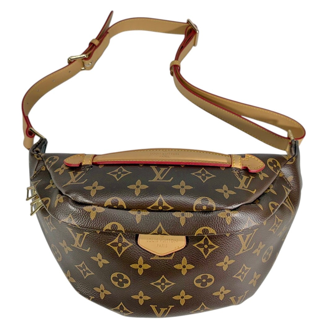 Famous Design Style Brown Monogram Bum Bag: Famous design style bum bag or crossbody bag with brown monogram coated canvas exterior and tan leather trim. Features adjustable shoulder strap with gold tone hardware, front zippered compartment, an