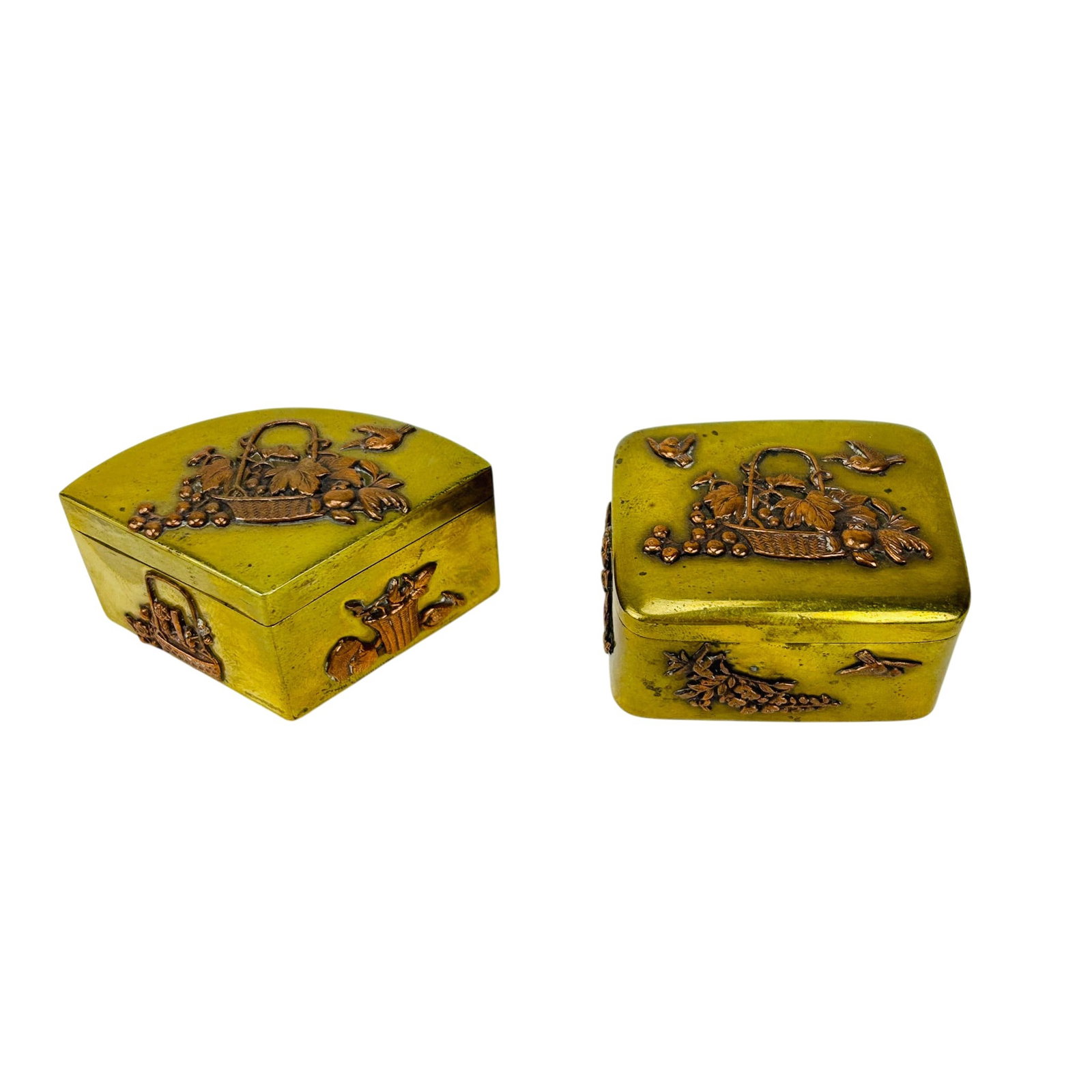 Japanese Meiji Period Trinket Jewelry Boxes 2p LOT: Pair of Japanese Meiji period brass tone trinket boxes, lot of two. Including one hinged rectangular and one fan form example. Each modeled with copper toned relief decoration depicting baskets, grape