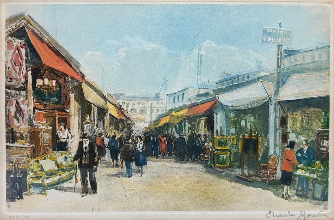 Framed Charles Moudin Paris Cafe Street Lithograph: Framed color lithograph depicting a bustling Parisian cafe and street market scene with pedestrians, awnings, and storefronts. Pencil signed “Charles Moudin” and numbered 449/500 in the lower