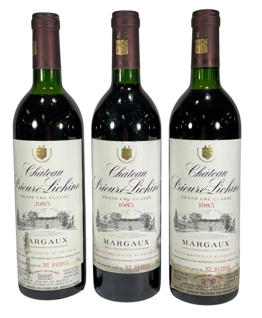 1985 Chateau Prieure-Lichine Margaux Bottles 3pcs: Group of three bottles of 1985 Chateau Prieure-Lichine Grand Cru Classe Margaux Bordeaux red wine. Bottles marked “Mis En Bouteille Au Chateau,” Appellation Margaux Controlee, and retain match