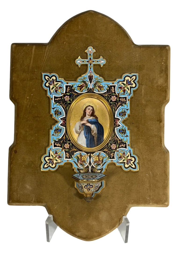 French Religious Champleve Enamel Holy Water Font: Antique French champleve enamel holy water font with gilt metal and colorful floral enamel decoration surrounding an oval portrait miniature of the Virgin Mary. Mounted on shaped velvet covered backin