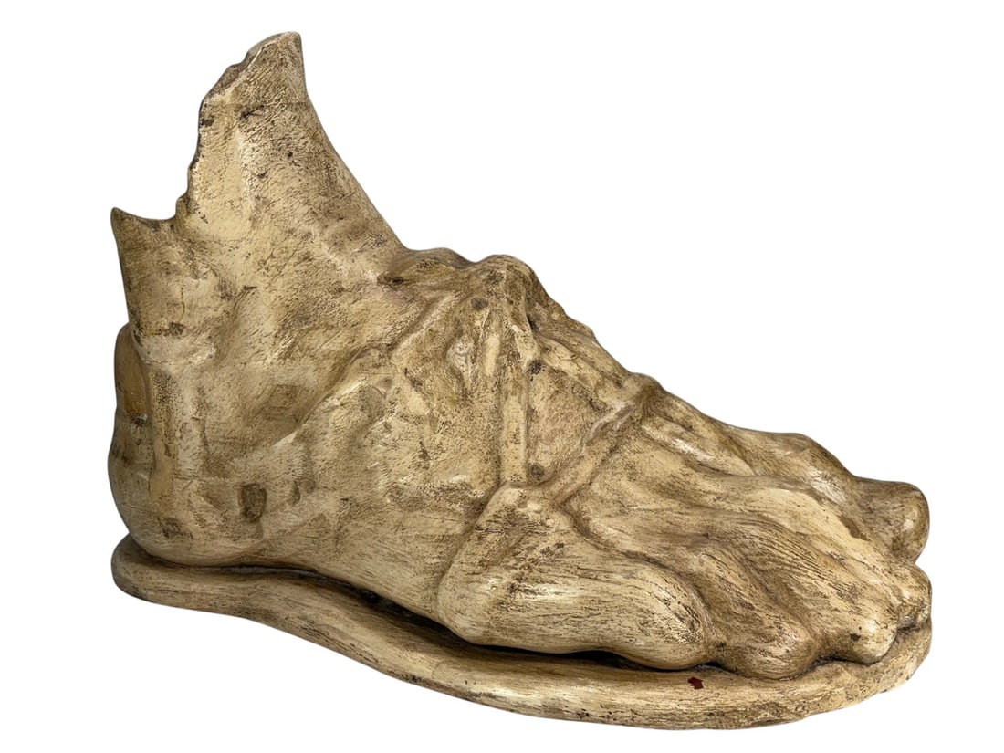 20th C Carved Wooden Roman Foot Fragment Sculpture: Carved wooden sculpture depicting a Roman foot with beige patinated finish.Constructed from multiple wood blocks and mounted on an integrated base. No visible marks, stamps, or signatures observed.