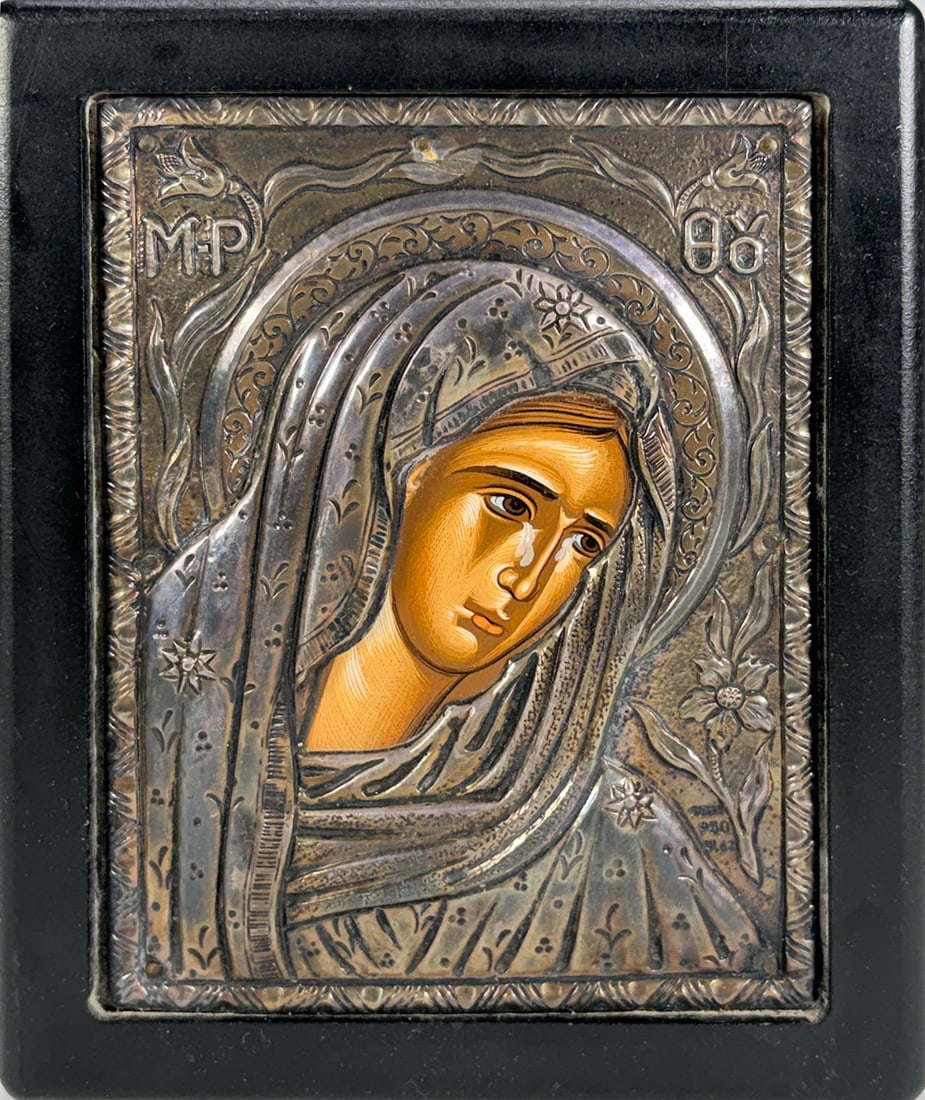 Greek Silver 950 Madonna Religious Icon Plaque: Framed Greek Orthodox icon depicting the Virgin Mary with repousse .950 silver overlay and hand painted facial details. Decorated with Byzantine style motifs and Greek lettering, mounted in a black