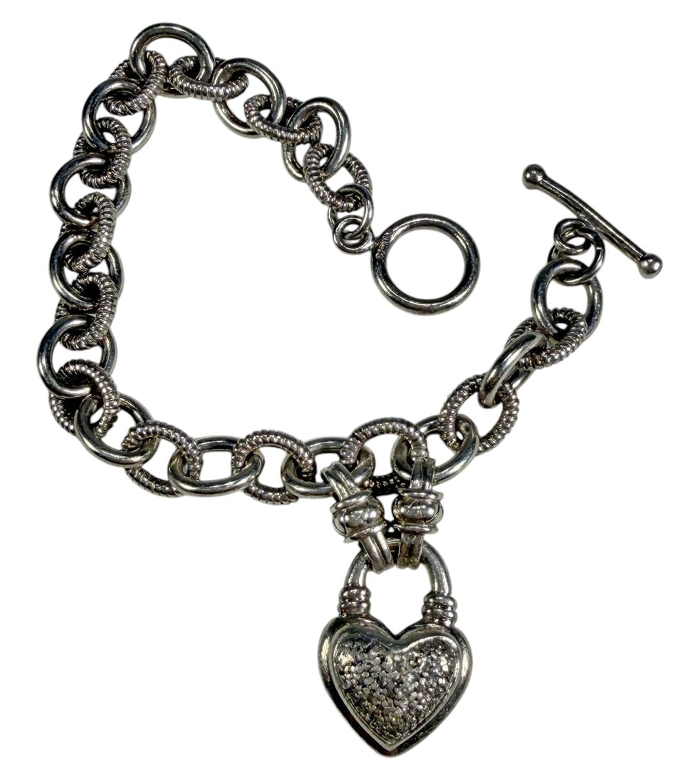 Udine 925 Silver Diamond Heart Charm Bracelet Link: Udine sterling silver link bracelet featuring alternating polished and textured oval links with toggle clasp. The bracelet is accented by a heart-shaped pave diamond charm measuring approximately 1