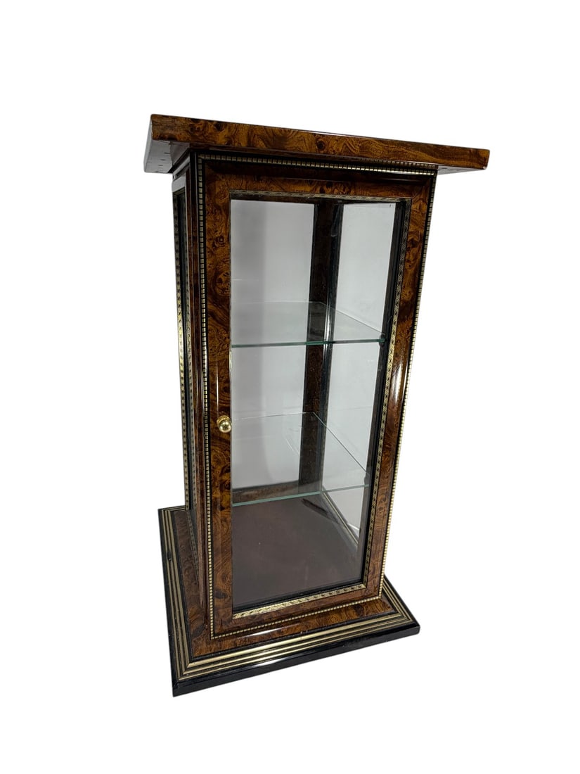 VTG Burlwood Style Mirrored Curio Display Cabinet: Decorative tabletop curio display cabinet featuring a burlwood style veneer finish with gilded accent borders and a bronze-tone knob. The cabinet has glass panels on all sides, a mirrored top, and