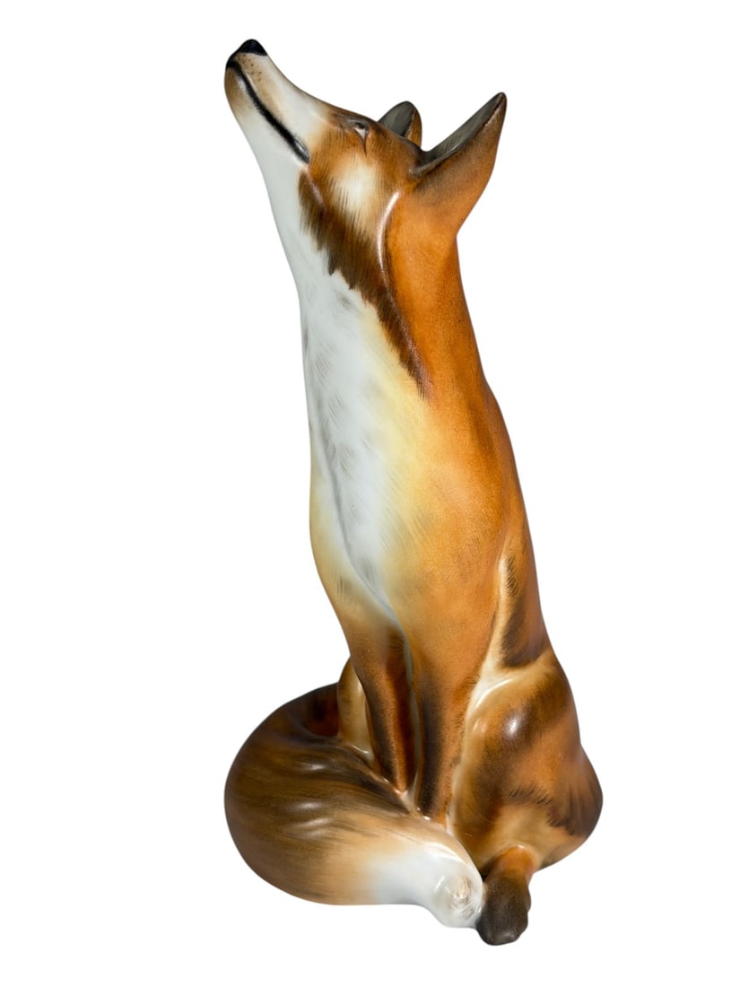 Herend Hungary Hand Painted Porcelain Fox Fig: Herend Hungary hand-painted porcelain fox figurine, model number 15308-0-00/MCD. Finely modeled in a seated fox form with detailed hand-painted decoration characteristic of Herend porcelain. The under