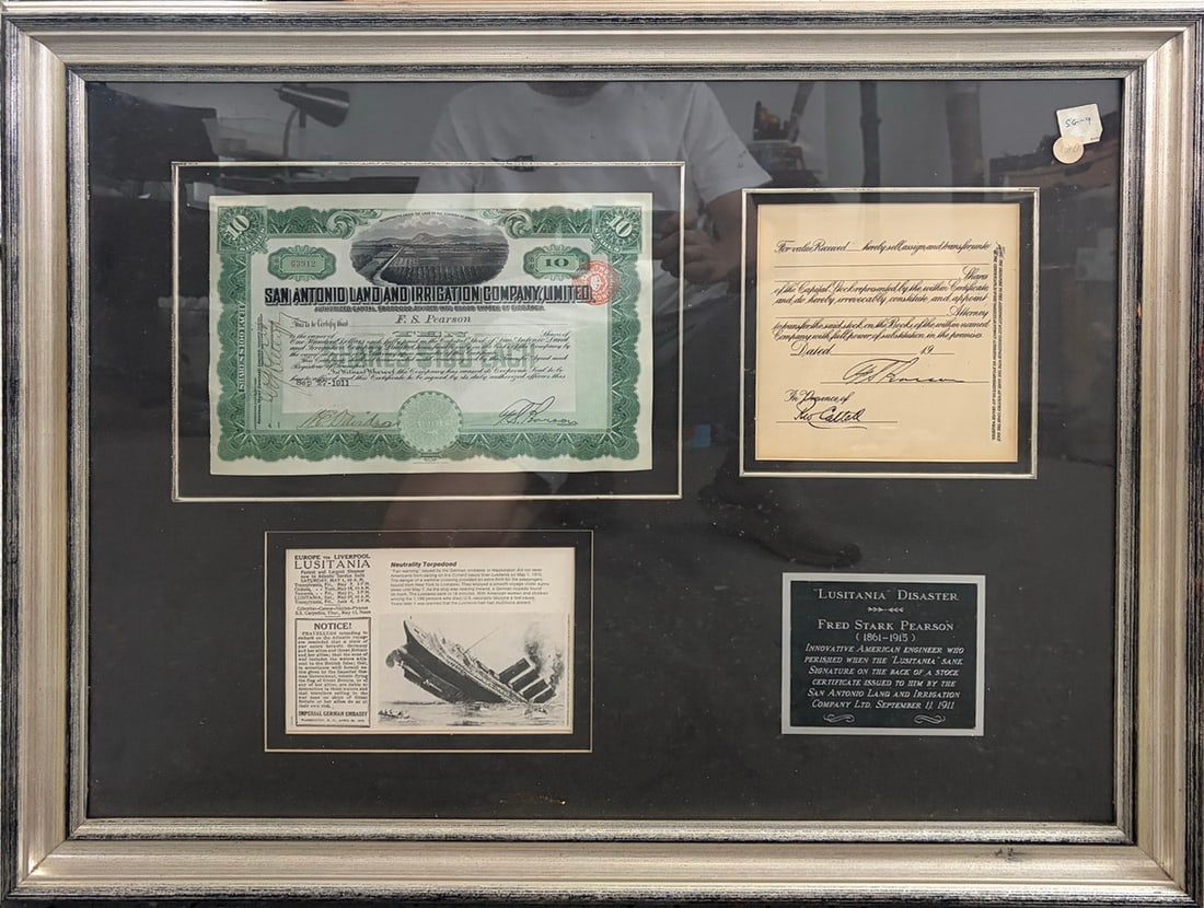 Lusitania Disaster Fred Stark Pearson Signed Stock: Framed historical display featuring a 1911 San Antonio Land and Irrigation Company stock certificate issued to Fred Stark Pearson. Includes Pearson's signed stock assignment endorsement, Lusitania-rel