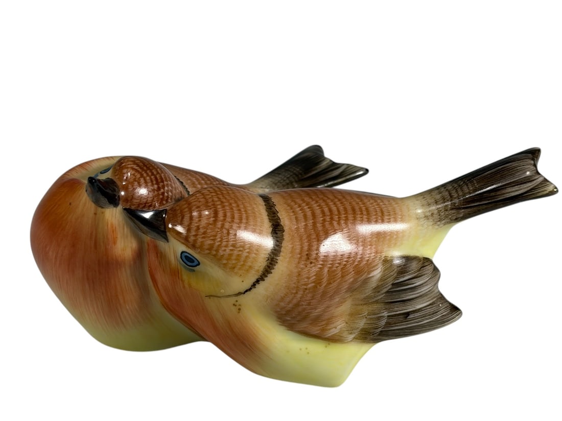 Herend Hungary Porcelain Pair of Songbirds Fig: Hand painted Herend Hungary porcelain figurine depicting a pair of closely perched songbirds with buff and brown plumage, blue eyes, and finely detailed feather decoration. The birds are modeled resti