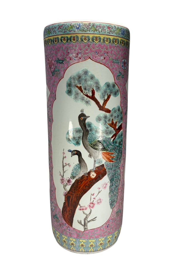 Chinese Famille Rose Porcelain Umbrella Stand: Chinese porcelain umbrella stand or floor vase decorated in the Famille Rose style palette. Features shaped reserves with peafowl and birds in landscape settings, surrounded by a pink floral scroll gr