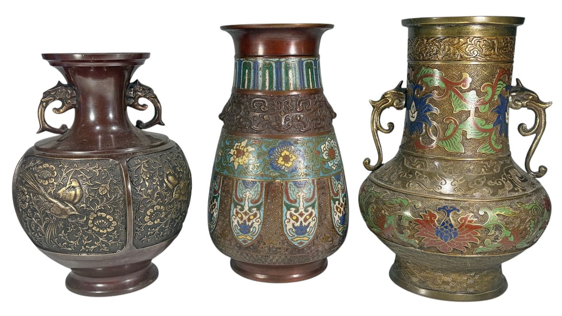 Japanese Bronze & Cloisonne Enamel Vases 3pc LOT: Group of three Japanese metal vases, including two cloisonne enamel examples and one bronze-tone vase with raised bird and floral decoration. Features dragon-form handles, floral motifs, and embossed 