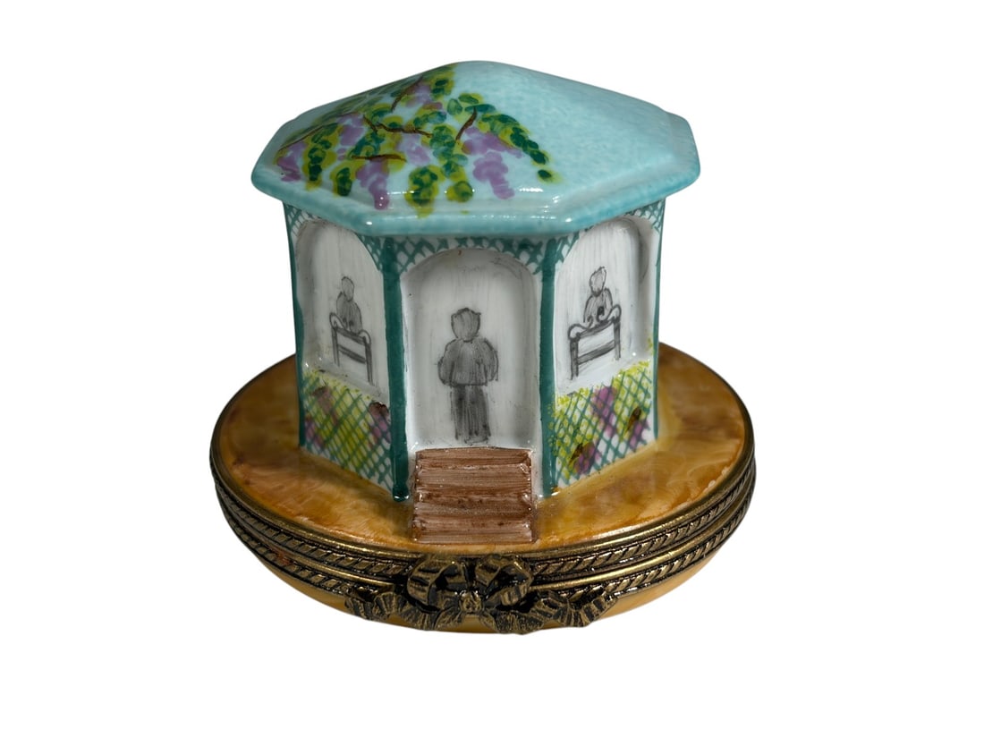 Limoges France Gazebo Garden Scene Trinket Box: Hand-painted Limoges porcelain trinket box modeled as an octagonal garden gazebo or pavilion. The exterior features architectural details including steps, trellis panels, and flowering vines beneath a