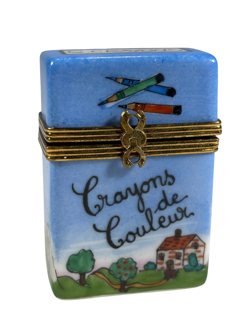 Rochard Limoges France Crayon Box Trinket Box Art: Hand-painted Rochard Limoges porcelain trinket box modeled as a box of colored crayons. The exterior is decorated with painted crayons, a pastoral landscape, and French inscriptions reading "Crayons d