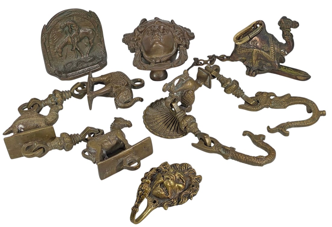Antique Bronze Figural Hardware & Decor 5pc LOT: Lot of 5 antique bronze decorative pieces including figural hanging elements, a female mask mount, lion head wall hook, End of the Trail bookend, and a hanging vessel or lamp component. Cast bronze wi