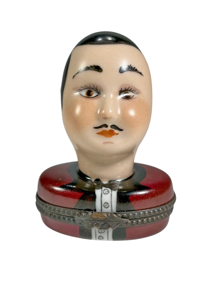 Rochard Limoges Gentleman Portrait Trinket Box: Hand-painted Rochard Limoges porcelain trinket box modeled as the bust of a gentleman with black hair, mustache, and formal tuxedo. The figural portrait form features detailed facial painting and gilt