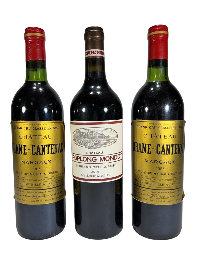 French Bordeaux Wine Bottles Collection 3pc LOT: Lot of 3 French Bordeaux wine bottles comprising two bottles of Chateau Brane-Cantenac Margaux 1983 Grand Cru Classe en 1855 and one bottle of Chateau Troplong Mondot Saint-Emilion Grand Cru 2016 Prem