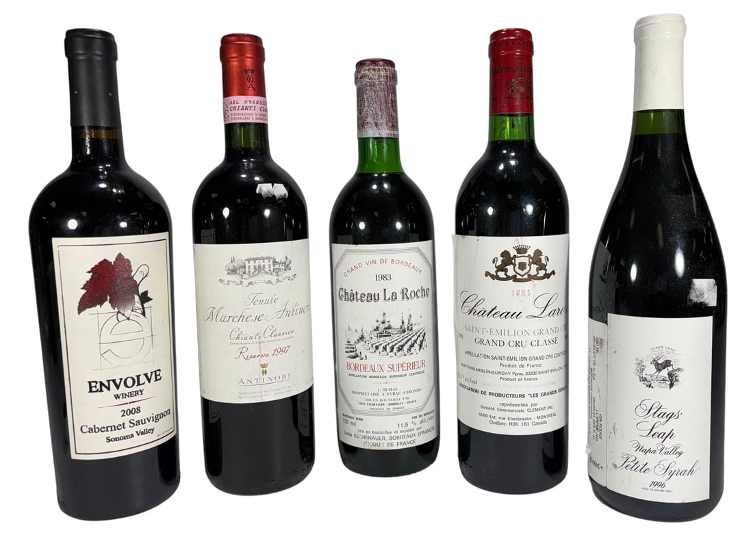 Chateau Larose & Antinori Riserva Wine 5pc LOT: Lot of 5 collectible wine bottles including Chateau Larose 1983 Saint-Emilion Grand Cru Classe, Tenute Marchese Antinori Chianti Classico Riserva 1997, Chateau La Roche 1983 Bordeaux Superieur, Stags'