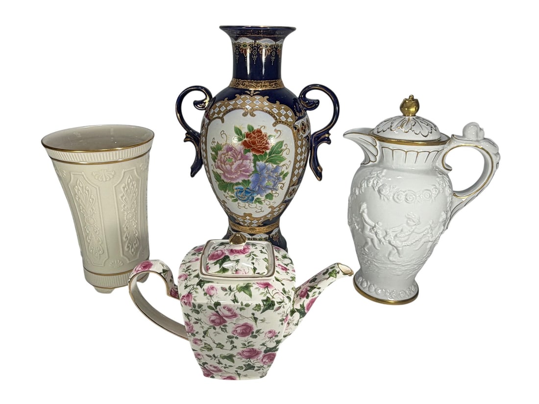 Assorted Decorative Porcelain Vases & Teapots 4pcs: Lot of 4 decorative porcelain pieces including a large floral vase, a beige and gilt Lenox vase, a white Capodimonte teapot with molded floral decoration, and a porcelain teapot decorated with roses. 