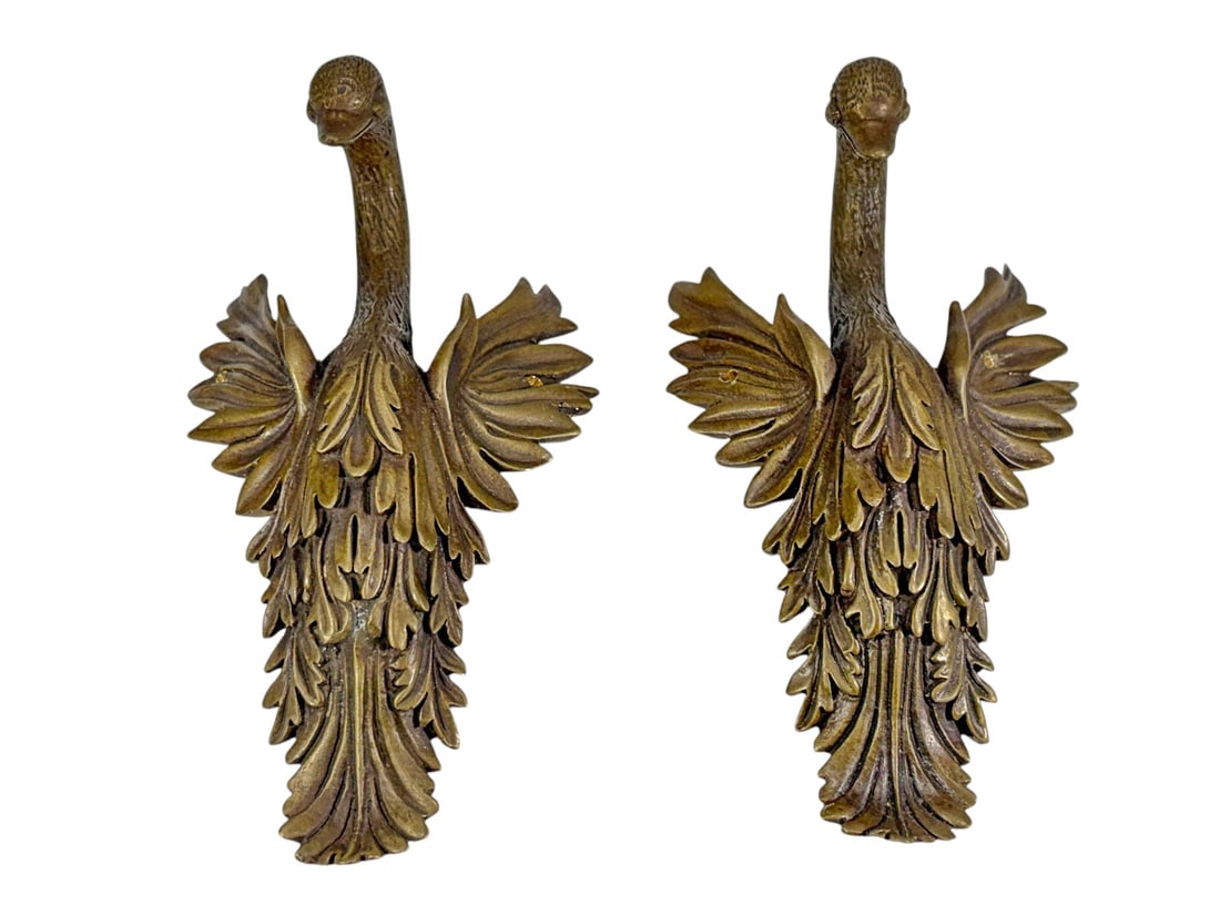 Pair Swan Form Bronze Wall Pockets Ornaments 2pcs: Lot of two decorative swan-form wall pockets or wall-mounted ornaments cast in bronze-tone metal. Each depicts a stylized swan with elongated neck, raised wings, and layered feather details forming a 