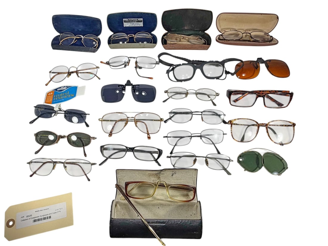 Collection of Eyeglasses Sunglasses & Cases 27pcs: Group of 27 pcs including eyeglasses, sunglasses, clip-on tinted lenses, protective goggles, reading glasses, and eyeglass cases. The assortment includes metal and plastic frame examples in various st