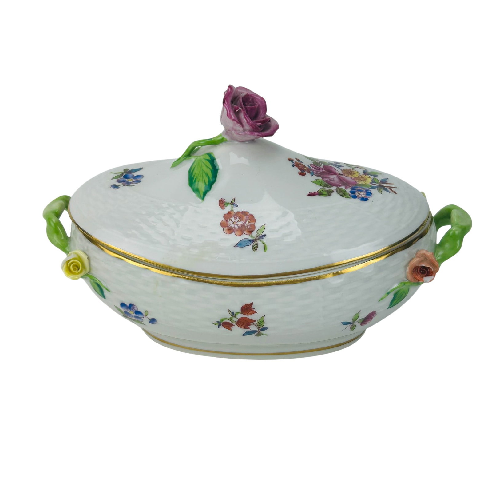 Herend Hungarian Porcelain Printemps Lidded Dish: Herend Hungarian porcelain covered dish in the Printemps pattern. Introduced in 1985. Oval form with basket weave molded body, hand painted floral sprays, gilt trim, applied rosebud side accents, and 