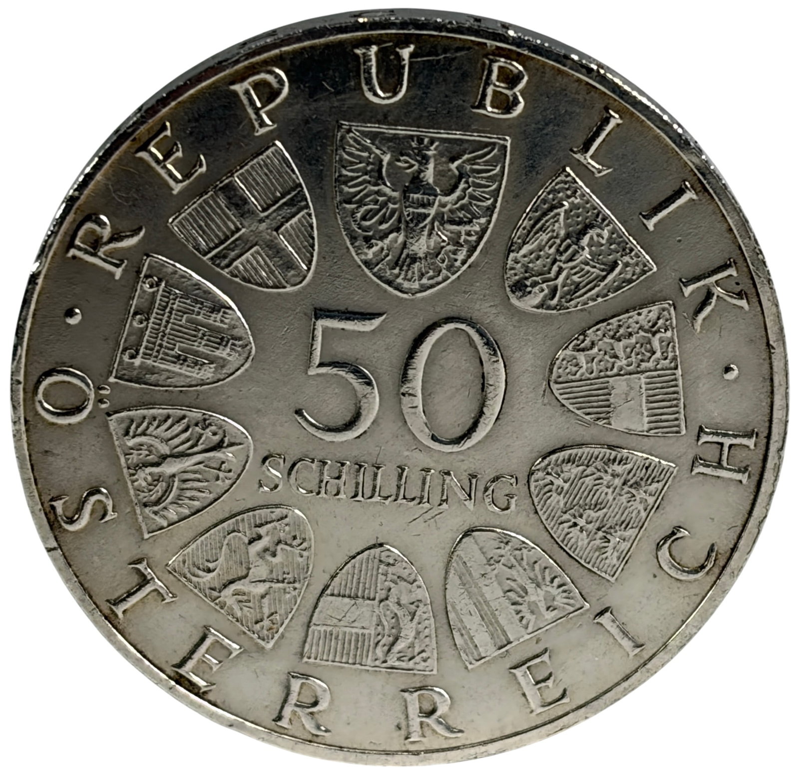 1969 Austria Silver 50 Schilling Maximilian Coin: 1969 Austria 50 Schilling commemorative coin honoring the 450th anniversary of the death of Emperor Maximilian I (1459-1519). Struck in .900 silver, weighing 19.9 grams and measuring approximately 33 