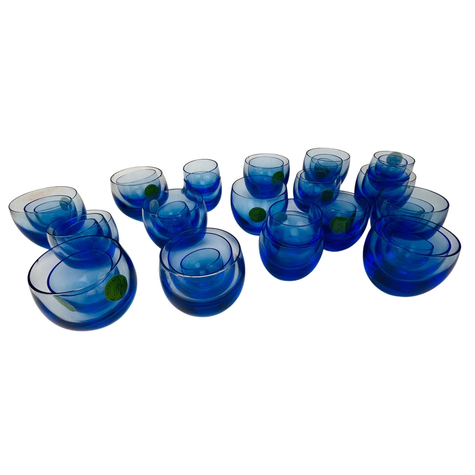 Cobalt Blue Nesting Roly Poly Barware Glasses 42pc: Estate collection lot of a total of forty two graduated blue glass cups / cordials with rounded forms and clear to cobalt blue shading. The group includes five different sizes with some examples nesti