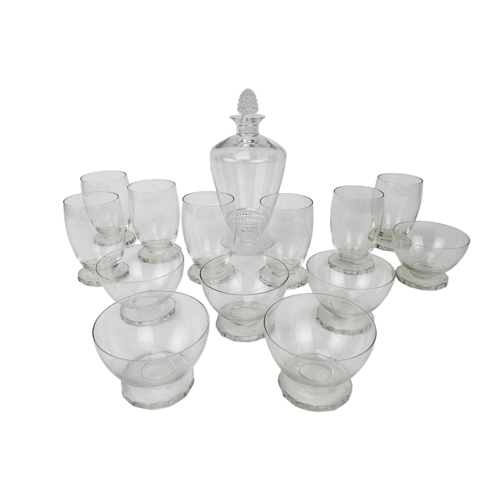 Crystal Bar Decanter & Glasses 14pc after Lalique: Clear crystal art glass barware group comprising a decanter with hobnail pattern finial stopper and molded hobnail decoration to the lower body. Accompanied with two different sized glasses with pedes