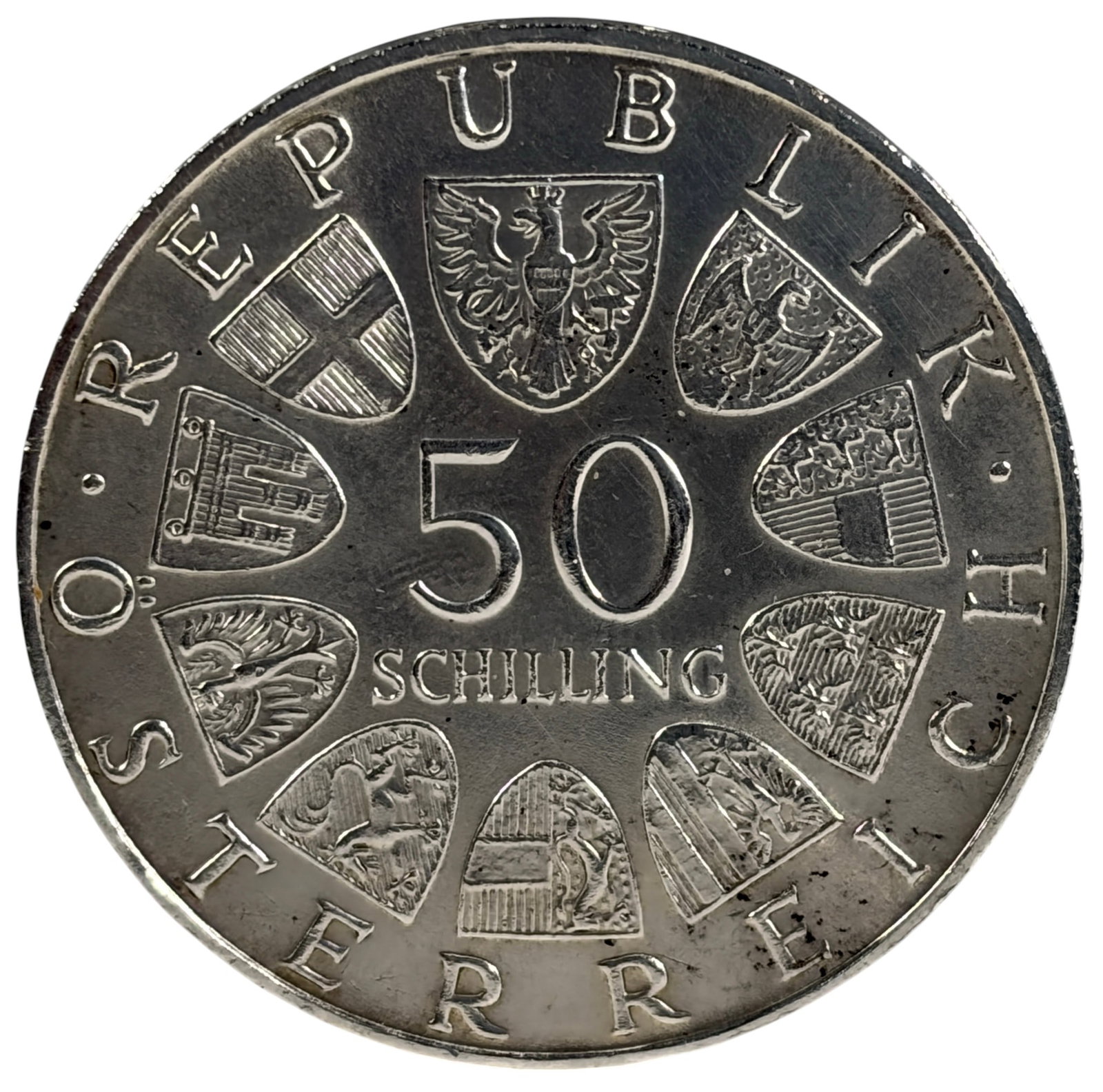 1971 Austria 50 Schilling Proof Silver Coin: Austria 50 Schilling Proof commemorative coins dated 1971, struck in 90% silver. Issued to honor Julius Raab (1891-1964), former Chancellor of Austria. Obverse features his portrait, with the Austrian