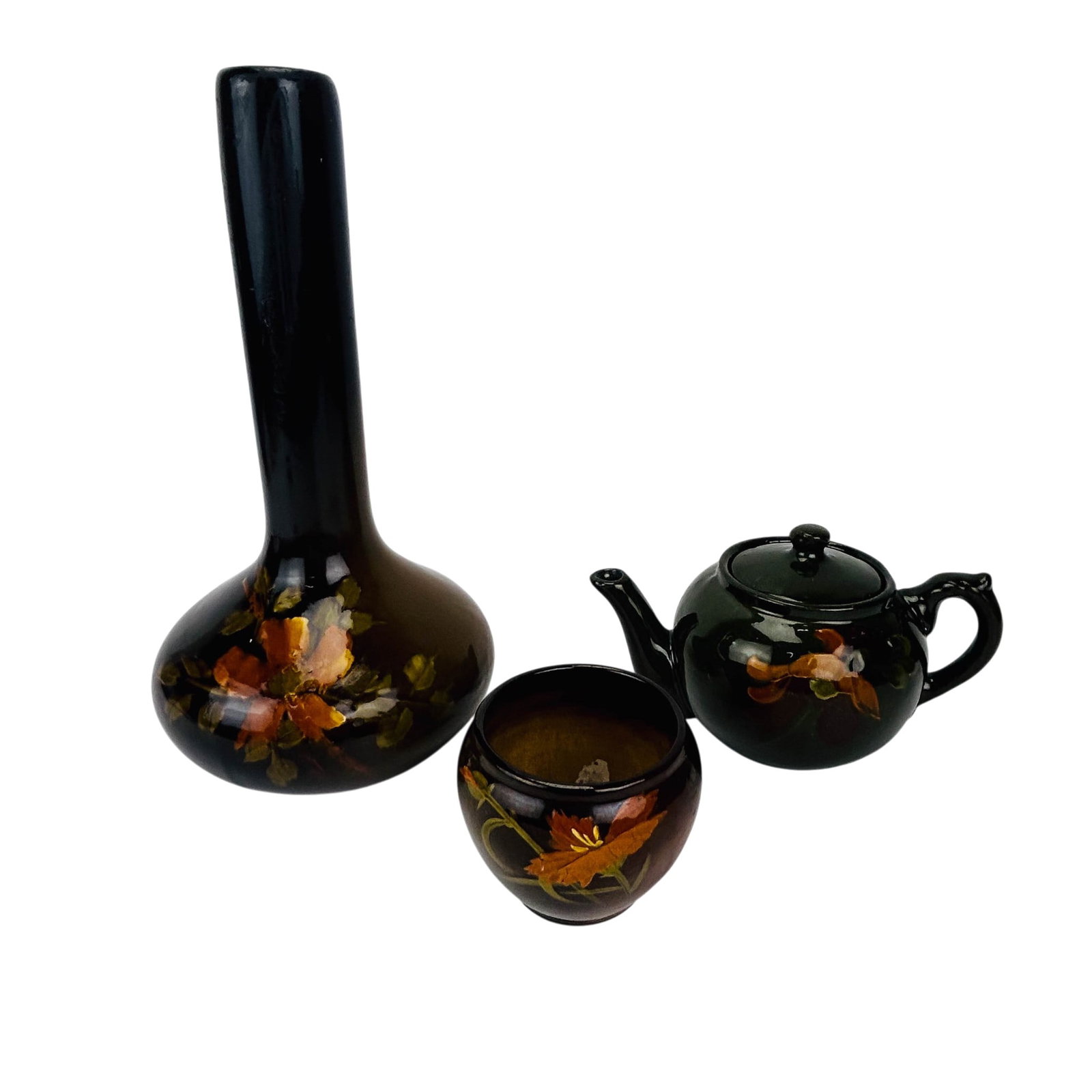 Owens & Loy Nel McCoy Art Pottery Vase Teapot LOT: Group of three American art pottery pieces. Includes an Owens Pottery vase decorated with hand painted orange floral motifs on a brown glazed ground, witgh impressed Owens mark and shape number to und