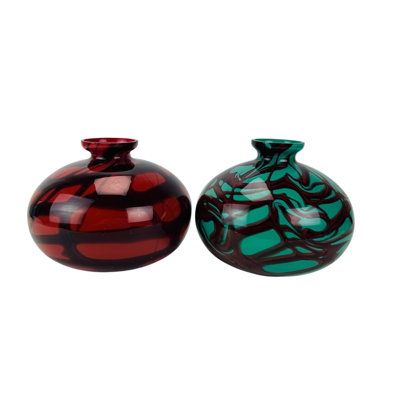 Bohemian Czech Studio Art Glass Bottles Vases 2pc: Bohemian Czech studio hand blown pair of contemporary art glass bottle form vases. One example features a ruby red ground with darker marbled swirls, while the second displays a turquoise green ground