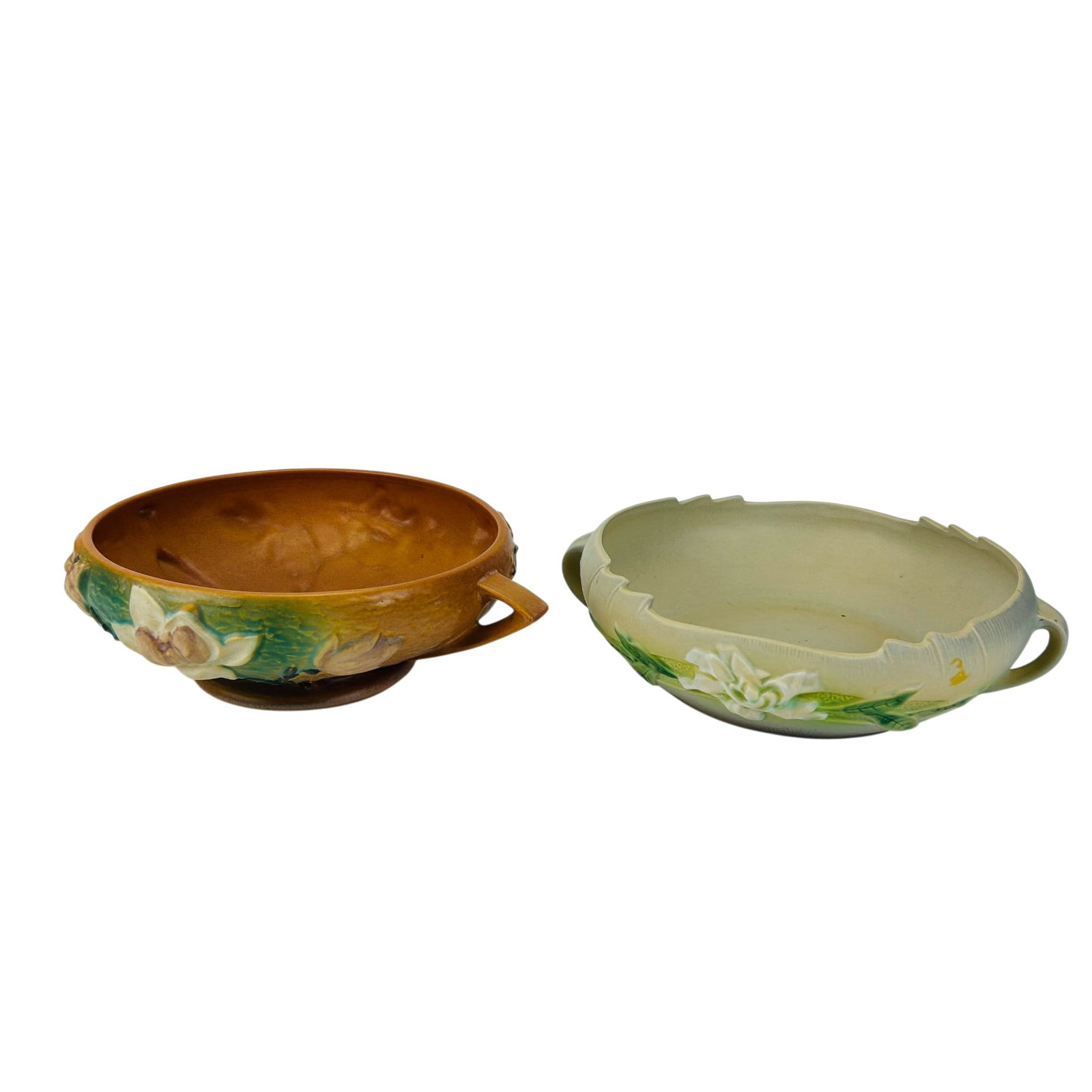 Roseville Magnolia & Gardenia Centerpiece Bowls 2p: Roseville American Art Pottery floral form centerbowls, lot of two. Includes a Magnolia pattern 1943 and Gardenia introduced 1950. Each decorated with molded floral blossoms, buds, and foliage against