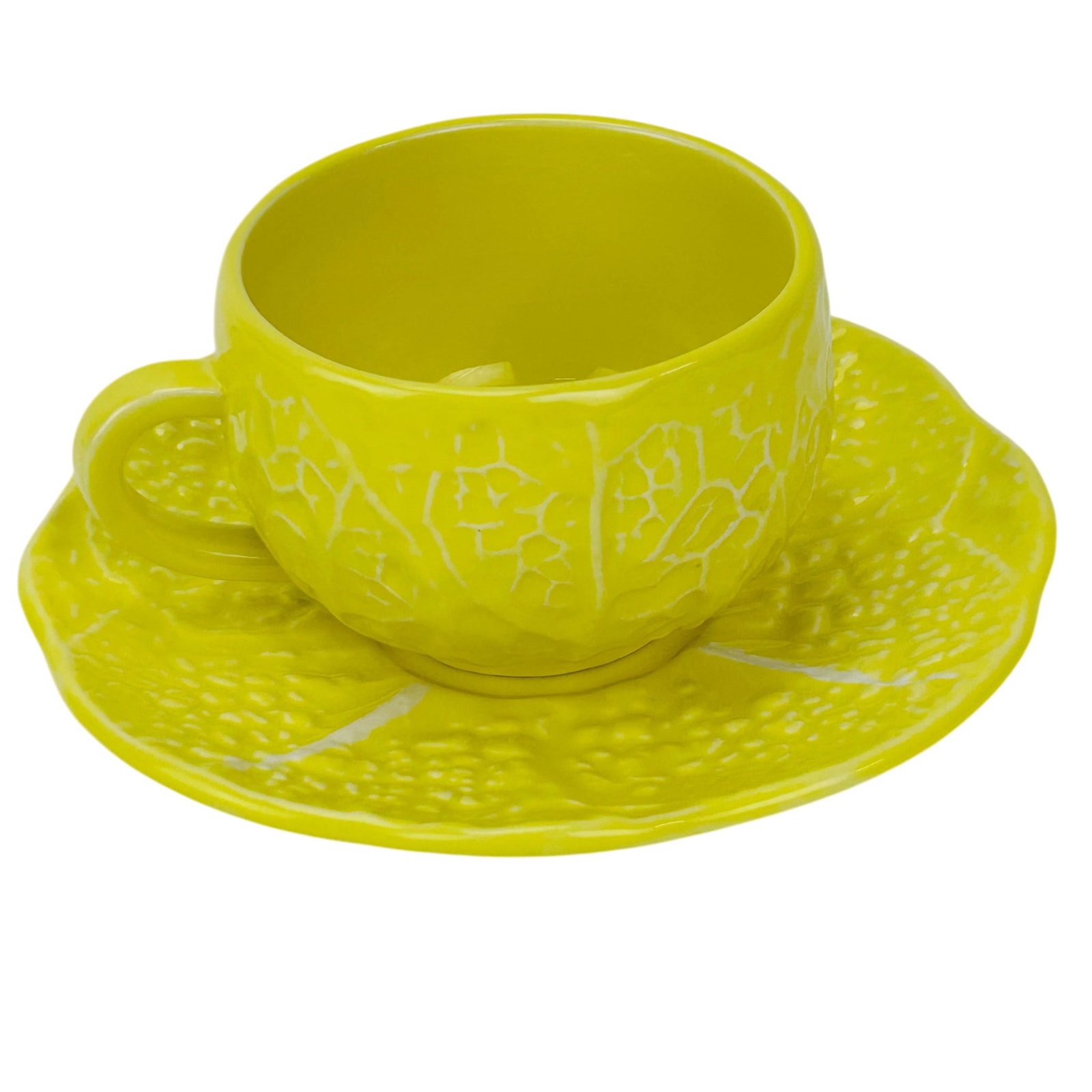 Secla Portugal Majolica Cabbageware Cup Saucer 19p: Mid century modern Portuguese majolica art pottery by Secla in the Cabbage Yellow pattern which is now discontinued. Includes ten tea cups and nine matching saucers. The design features molded cabbage