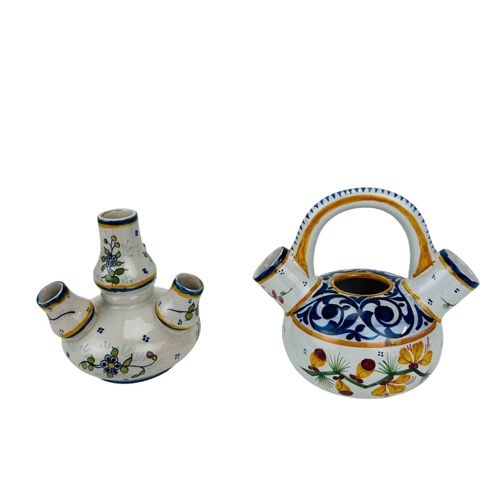 Quimper Faience Pottery Tulip Vase & Handled Jug: Lot of two French Quimper faience art pottery vessels. Includes a three spout tulip vase decorated with floral motifs and figural scenes, and a handled multi spout jug featuring cobalt foliate ornamen