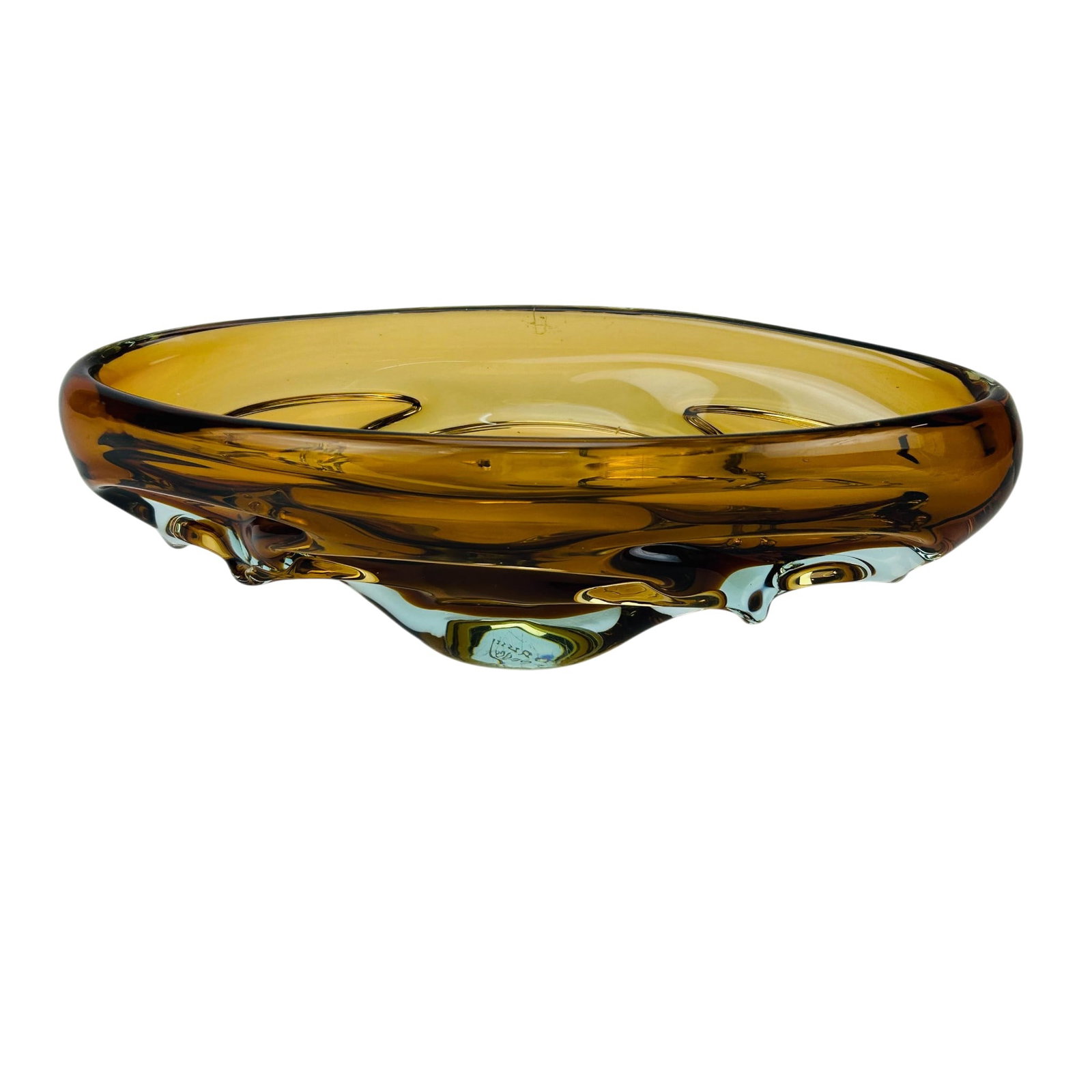 Daum France Amber Clear Art Glass Centerpiece Bowl: Heavy centerpiece bowl of elongated oval form piece features an amber toned body over a pale blue cased base with sculptural freeform contours and molded organic decoration. Thick walled construction 
