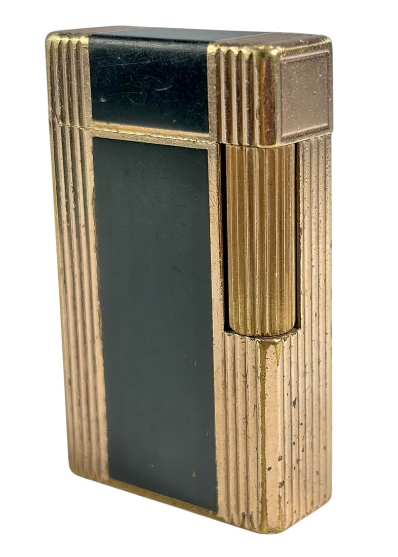 S.T. Dupont Paris Lacquer Lighter France Gold Tone: Vintage S.T. Dupont Paris pocket lighter featuring a gold-tone ribbed metal body with black lacquer panels in a classic Art Deco-inspired design. Marked S.T. Dupont Paris, Made in France on the base. 