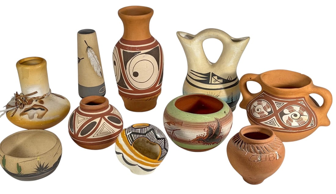 Assorted Signed Navajo Southwest Pottery 10pc LOT: Collection of ten Southwest pottery items including miniature vases, bowls, jars, a wedding vase, and other decorative forms with hand-painted geometric and traditional designs. One example is marked 