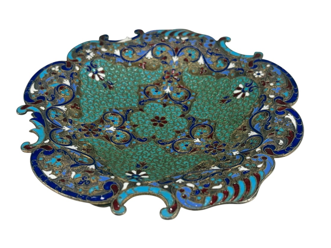 Russian 835 Silver Cloisonne Enamel Footed Dish: Probable Russian 835 silver footed dish with intricate polychrome cloisonne enamel decoration in turquoise, cobalt blue, white, red, and gilt tones featuring scrolling floral motifs. Raised on three b