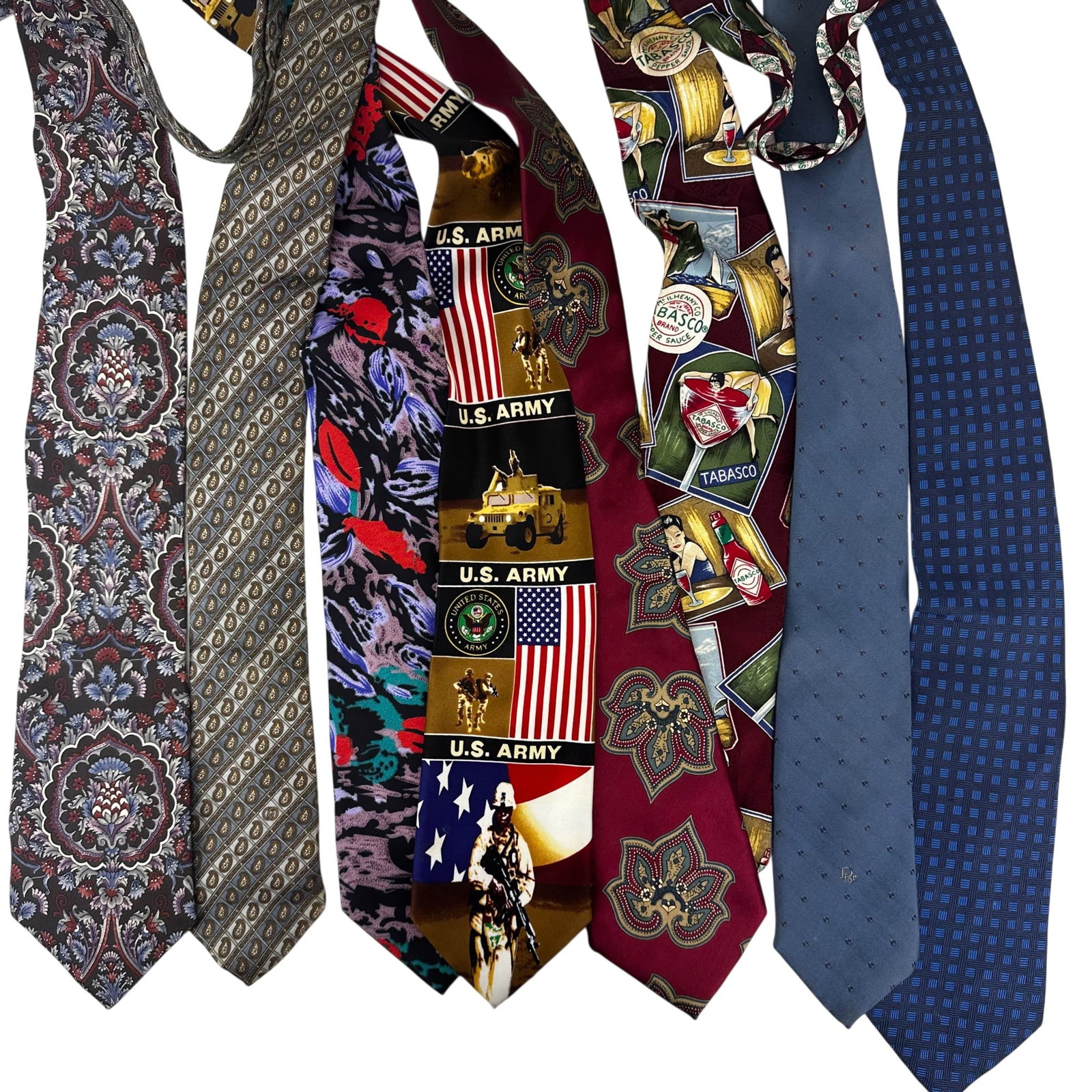 Dior Gucci Polo Lauren Designer Silk Ties 8pc LOT: Collection of eight neckties including Ralph Lauren, Christian Dior Monsieur, Polo by Ralph Lauren, Gucci, Tabasco, and U.S. Army examples. Assortment features geometric, floral, paisley, novelty adve