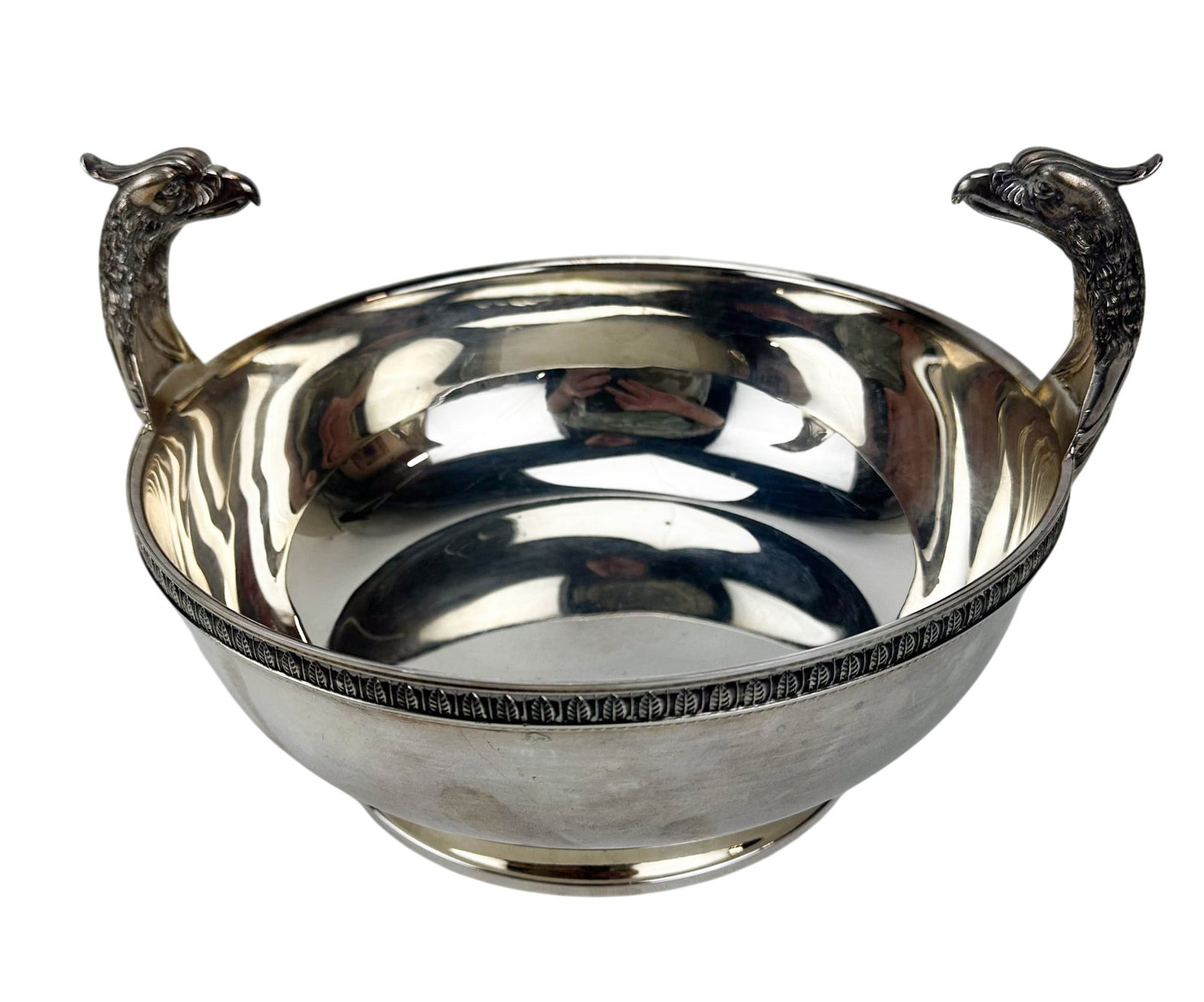 Christofle Silverplate Malmaison Eagle Head Bowl: Christofle French silverplate centerpiece bowl modeled in the Malmaison pattern circa 1980. Raised on a circular foot with opposing eagle head handles and a decorative band encircling the rim. The und