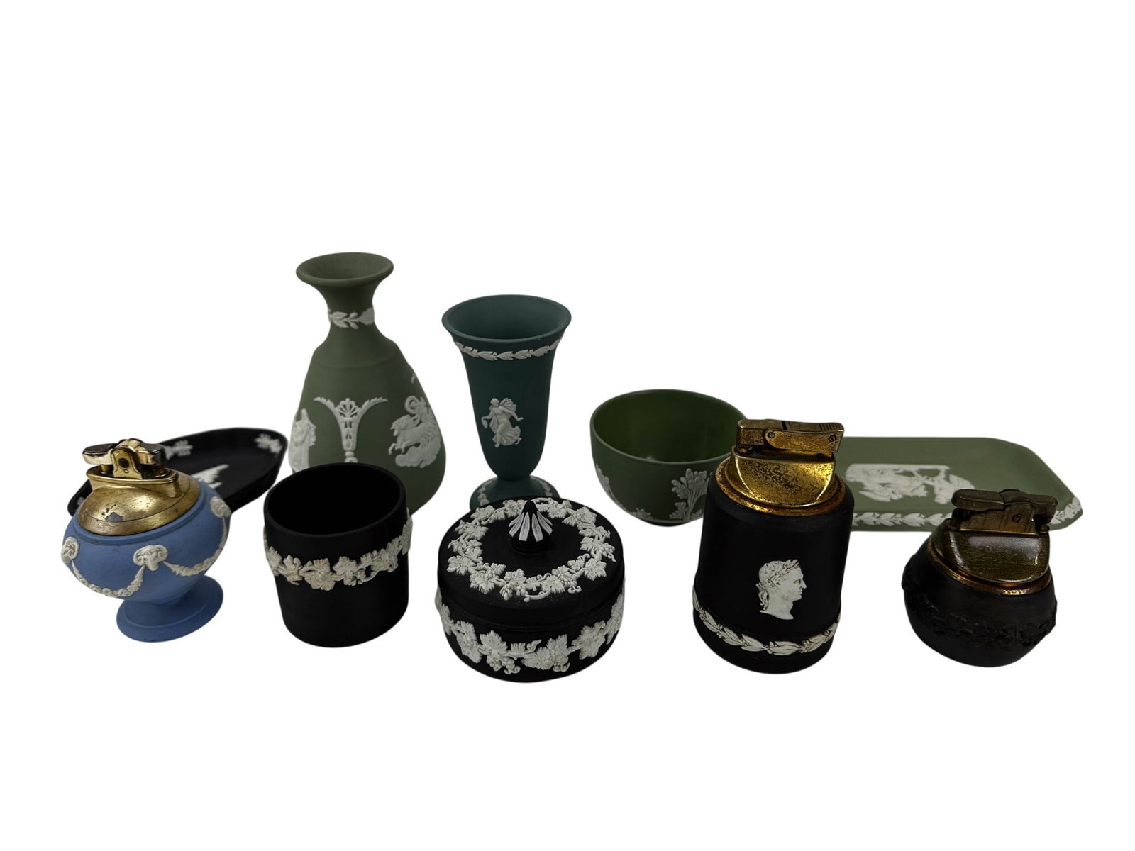 Wedgwood Jasperware Lighter Box Vase Tray 10pc LOT: Collection of ten Wedgwood English Jasperware pieces in sage green, black, teal and blue colorways. Lot includes a rectangular pin tray, bowl, footed vase, bottle form vase, round covered trinket box,