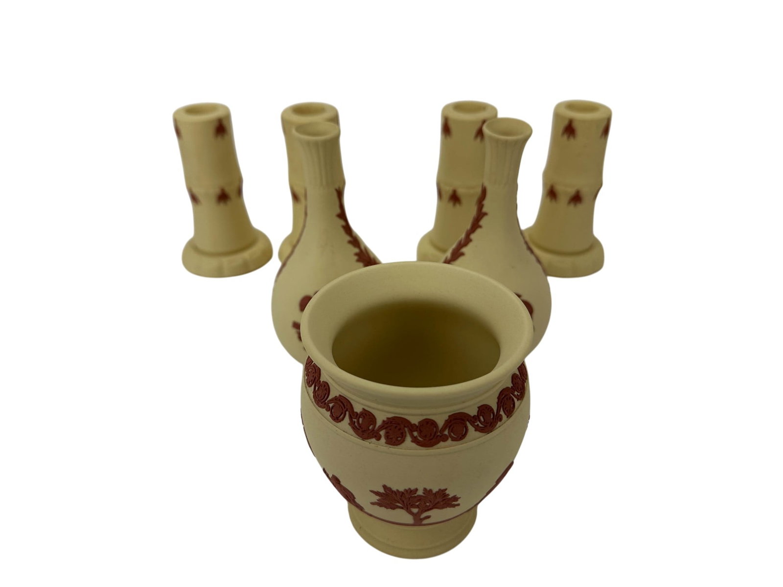 Wedgwood Terracotta Primrose Yellow 7pc ESTATE LOT: Group of seven Wedgwood Terracotta on Primrose Yellow Jasperware decorative articles. Lot includes four candlesticks, two bud vases, and one cachepot. Each example features classical neoclassical moti