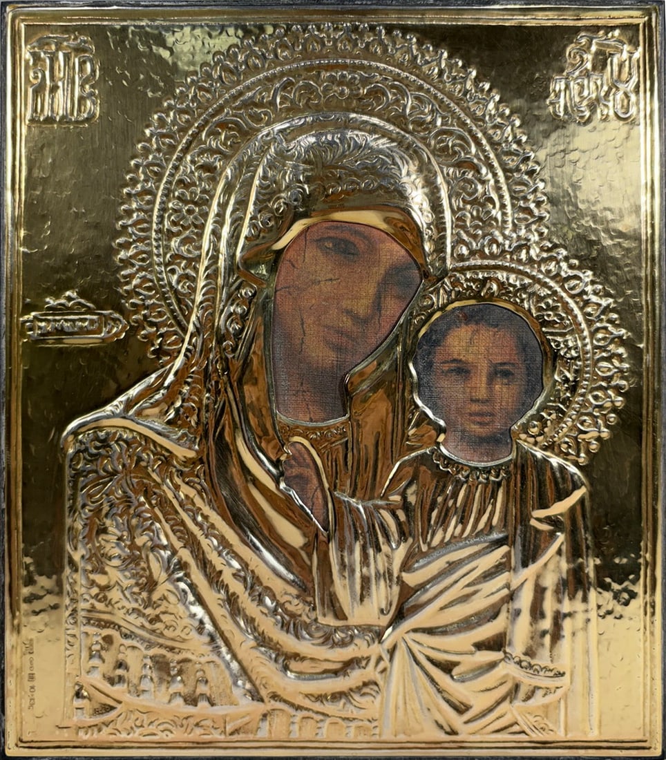 Italian Religious 925 Silver Icon Virgin & Child: Italian Religius icon depicting the Virgin Mary and Christ Child with a repousse .925 sterling silver riza over a painted panel. Hallmarked 925 with additional maker's marks and model number 10-13C on