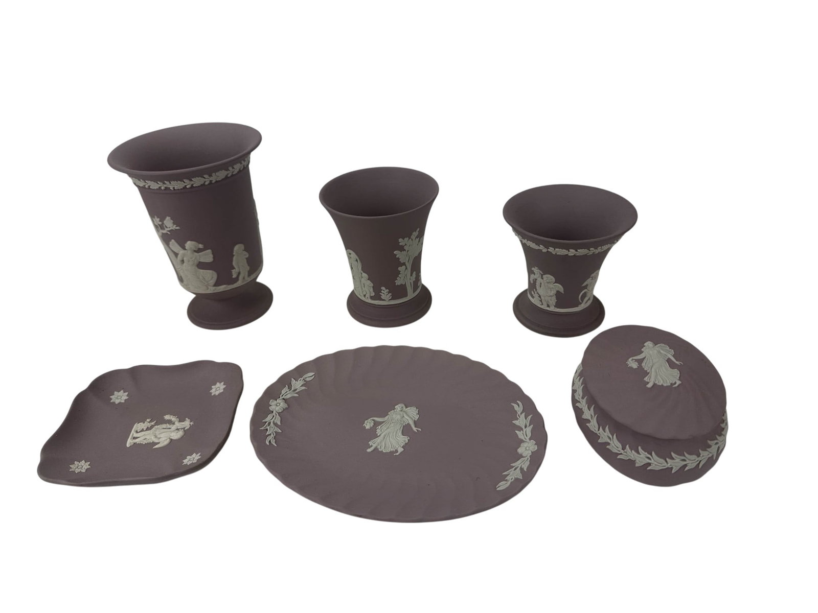 Wedgwood Lilac Jasperware Vase Dish Tray Box LOT: Collection of six Wedgwood England Lilac jasperware decorative articles comprising a footed vase with classical maidens in relief, two pedestal cachepots decorated with cherub and figural motifs, an o