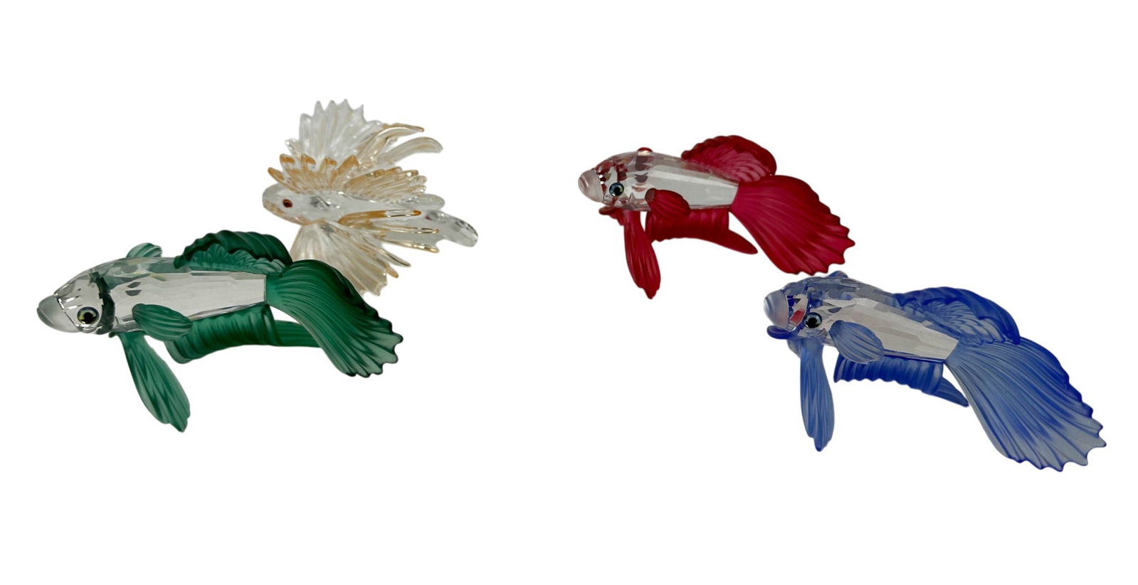 Swarovski Siamese Fighting Lion Fish Figurine LOT: Includes three Siamese Fighting Fish, one in Green((2000-2004). Blue (1999-2005). Red (2004-2005). All thre emodeles were designed by Heinz Tabertshofer). Lion Fish. Designed by Martin Zendron. (2002-