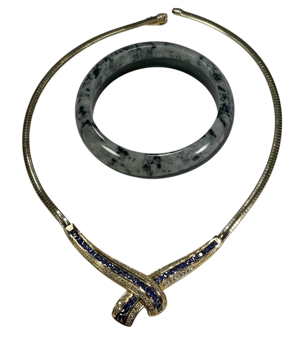 18K Over Sterling Necklace & Stone Bangle 2pc LOT: Two-piece jewelry lot including an 18K gold over sterling silver necklace featuring a flexible snake chain with a geometric crossover centerpiece channel set with square-cut blue sapphires, together w