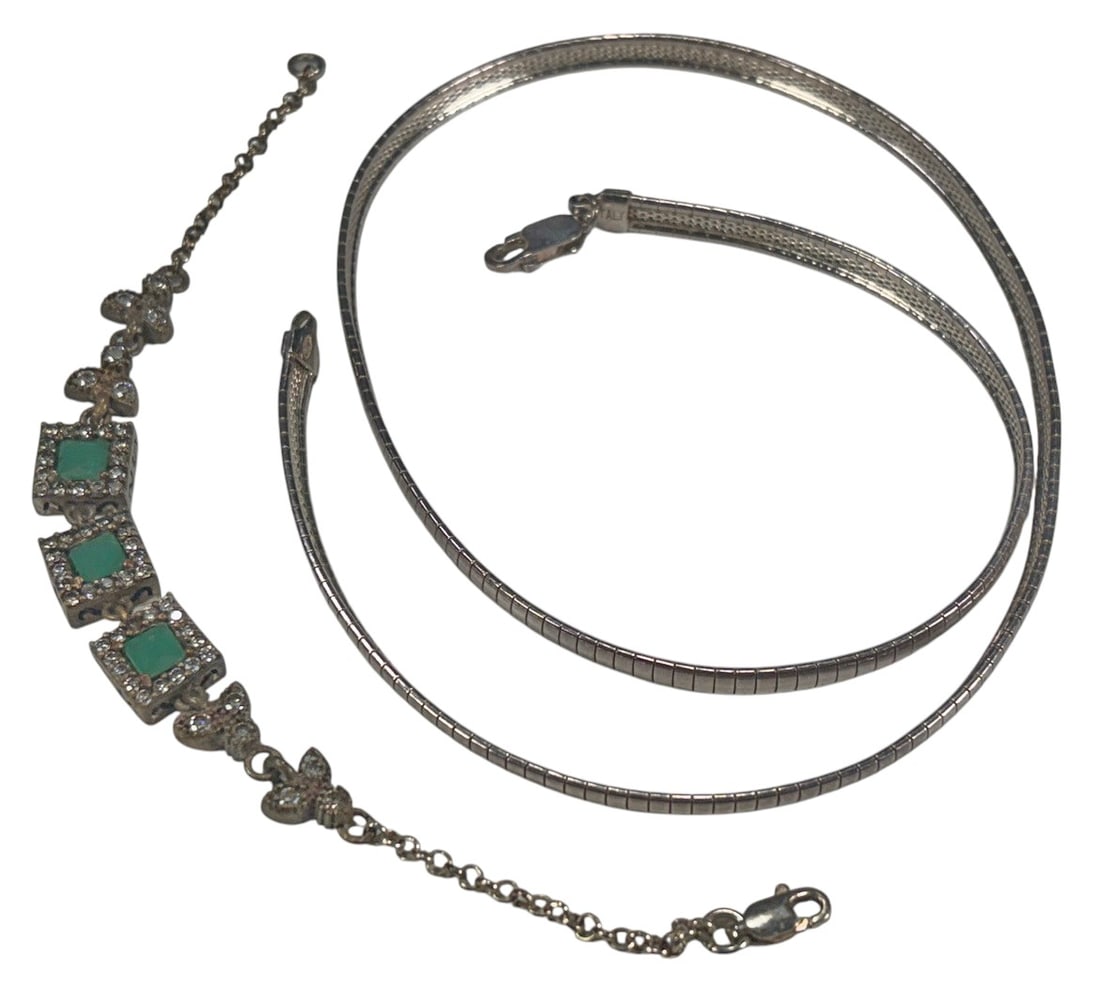 925 Sterling Silver Necklace & Bracelet Jewelry 2p: Two-piece sterling silver jewelry lot. Includes one Italian sterling silver snake chain necklace marked Italy 925, measuring approximately 19 inches in length and weighing approximately 24 grams. Also
